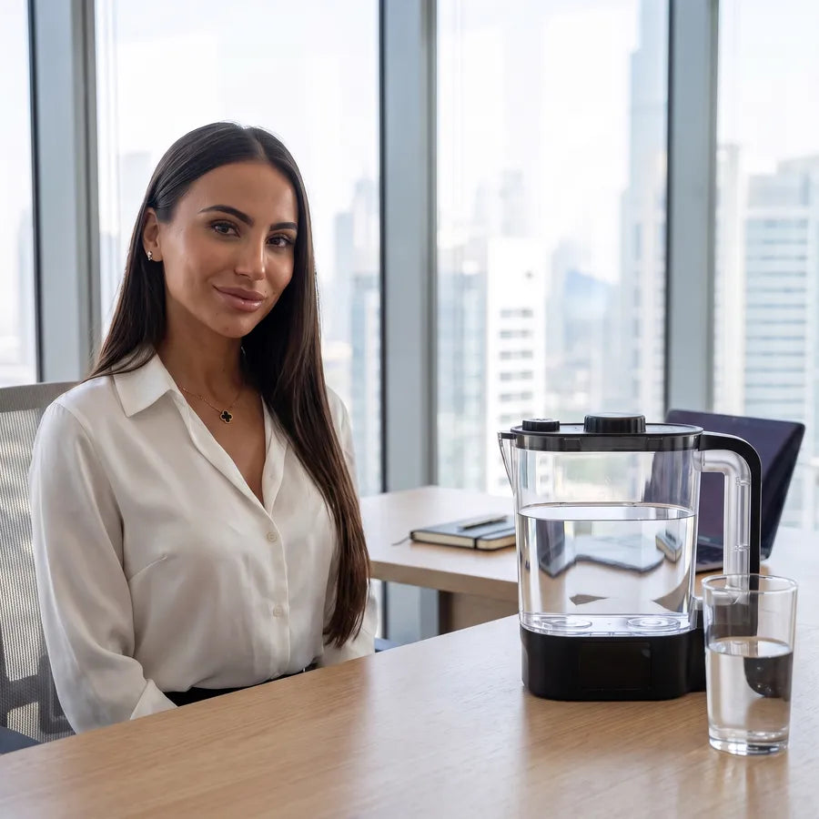 Co-founder Johanna with the H2 Pitcher at the office